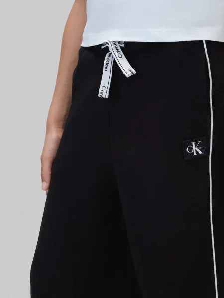 Calvin Klein Jeans спортен панталон за деца с черно