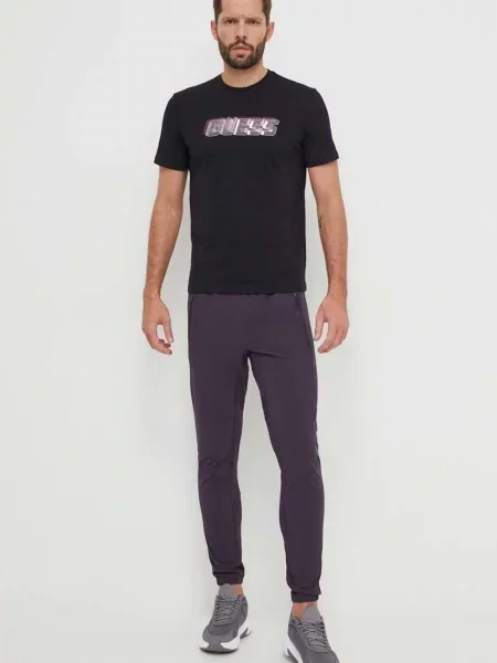 Hlače za vadbo adidas Performance vijolična