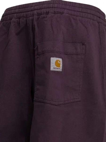 Su raišteliu šortai Carhartt Wip su autografu violetinė