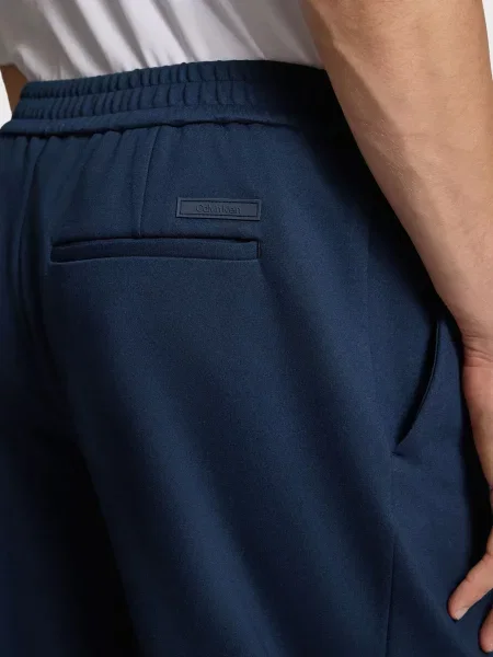 Трикотажные зауженные брюки Calvin Klein синие