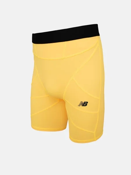 Спортивные шорты New Balance желтые