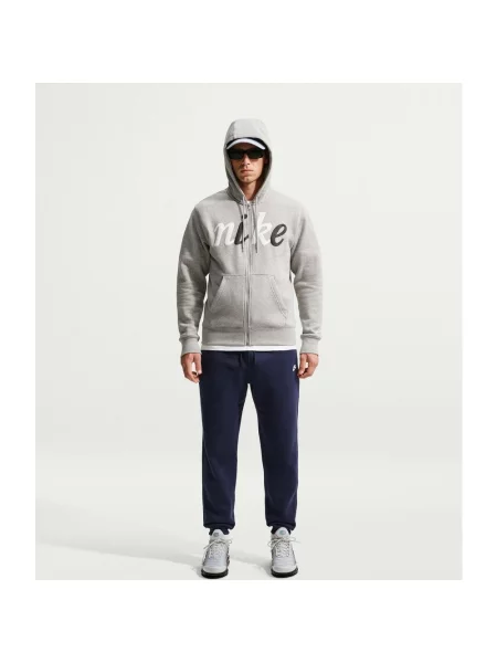 Długie spodnie Nike Club Fleece Cuffed granatowy S niebieskie