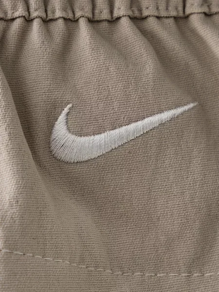 Cargo nadrág Nike Acg: All Conditions Gear bézs