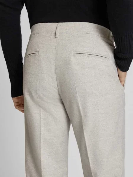 Spodnie o kroju relaxed fit w kant Profuomo