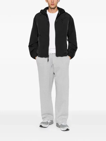 Haftowane spodnie The North Face do biegania szare