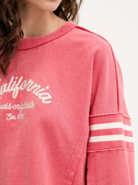 Свитер Guess Originals с принтом розовый