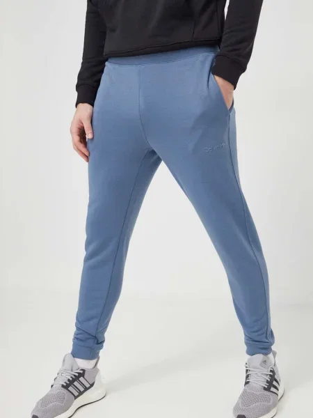 Pletené nohavice Calvin Klein Jeans modrá