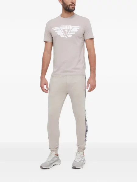 Pantaloni Guess alergare cu autograf