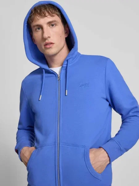 Sweter Superdry z kapturem z autografem niebieski