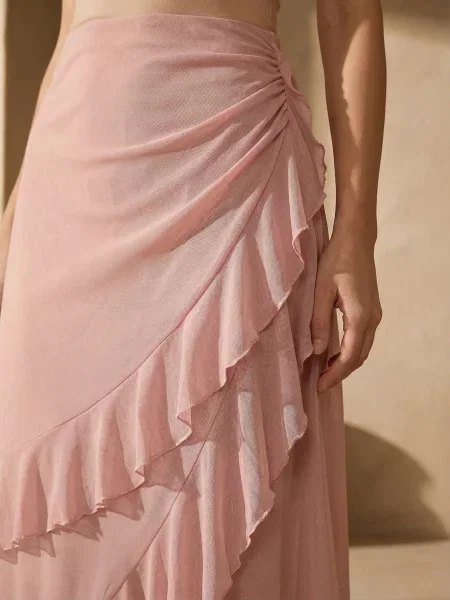 Асиметрична міді-спідниця з воланами рожевий