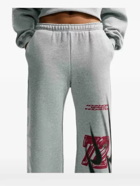 Pantaloni Nike din fleece alergare clasici roz