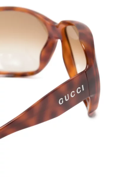 Saulės akiniai Gucci Eyewear ruda