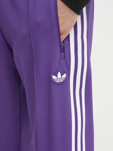 Спортивні штани adidas Originals REAL ICON TP з аплікацією фіолетовий