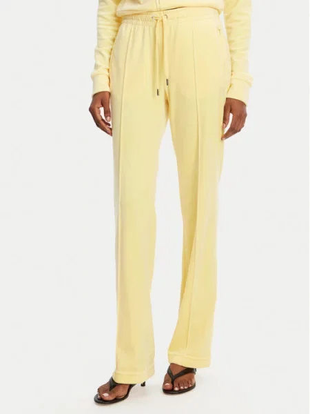 Spodnji del trenirke Juicy Couture rumena