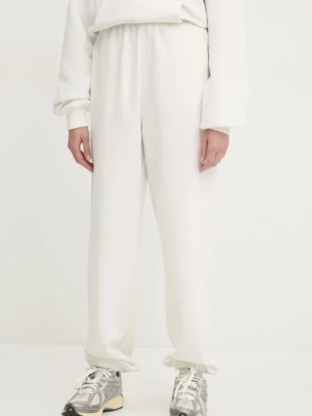 Спортен панталон Karl Kani бежово с изчистен дизайн бяло