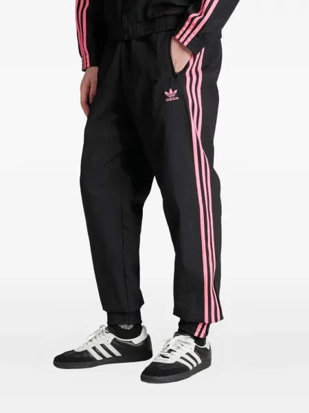 Pantaloni Adidas cu dungi din piele roșu