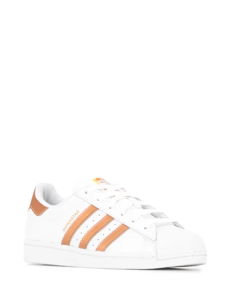 Nėriniuotos sportbačiai Adidas Superstar su raišteliais balta