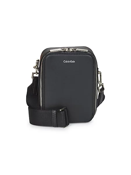 Calvin Klein Torbica za okrog pasu Ck Sleek Reporter Xs črna