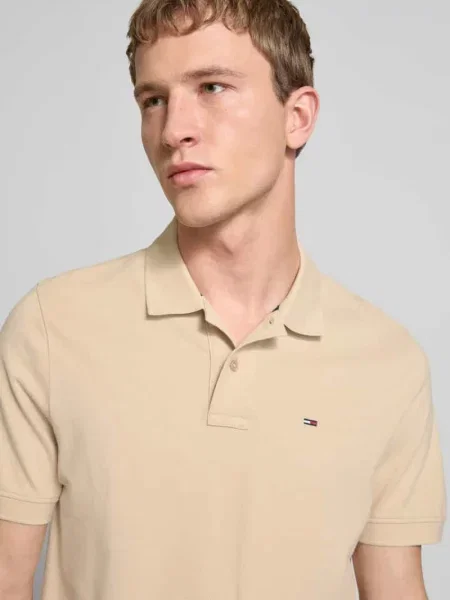 Koszulka polo Regular Fit z czystej bawełny Tommy Jeans beżowa