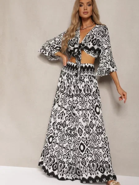 Czarno-Biały Komplet Krótka Bluzka Kopertowy Wiązany pod Biustem Szerokie Spodnie z Gumką w Talii Viknelas biała