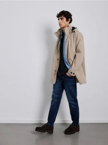 Reserved Blugi carrot slim cu efect prespălat bleumarin