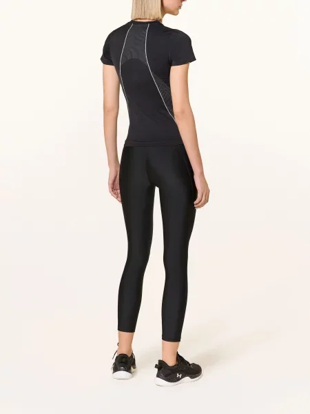 Legginsy Under Armour o krotszym kroju z nadrukiem czarne