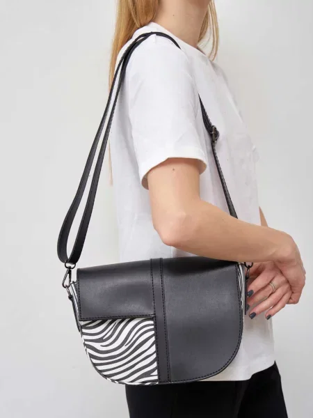 WeLassie Сумка zhnocha-sumka-dzhll-chornij-z-blim Білий/чорний Штучна шкіра біла