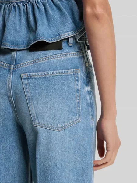 Jeans z szerokimi nogawkami z czystej bawełny z kantami Hugo niebieskie