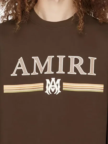 Dryžuotas džemperis Amiri su autografu ruda