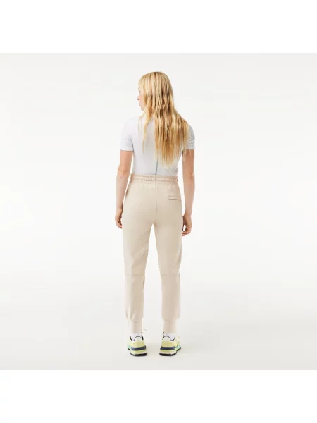 Зауженные спортивные штаны Lacoste красные