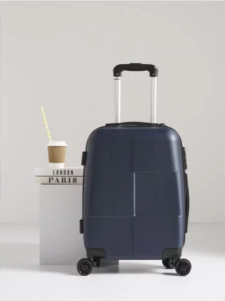 Sinsay Tvrdý cestovní kufr na kolečkách námořnická modrá