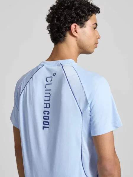 T-shirt z nadrukiem etykiety Adidas Training błękitna