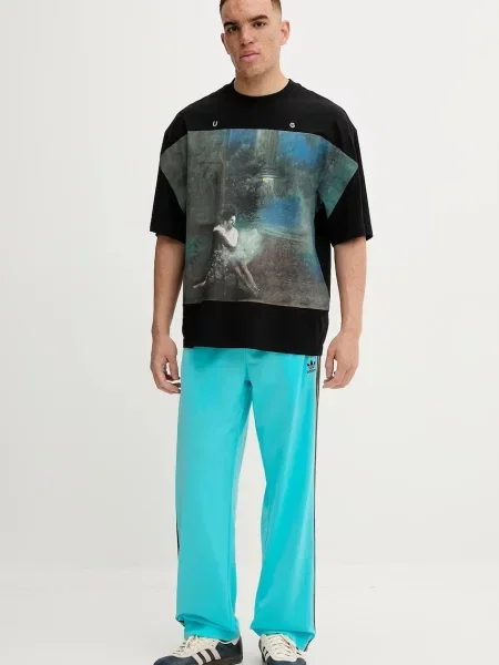 Adidas Originals spodnie dresowe Firebird wzorzyste niebieski