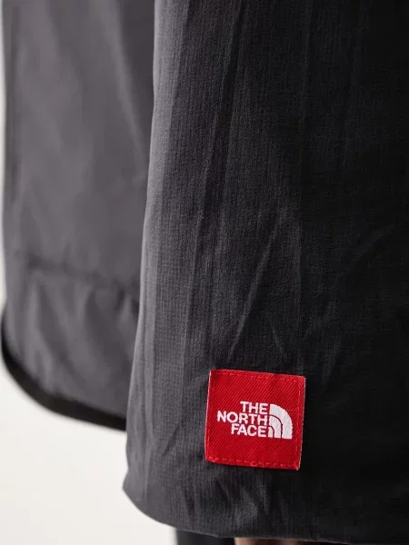 The North Face двостороння куртка Redbox