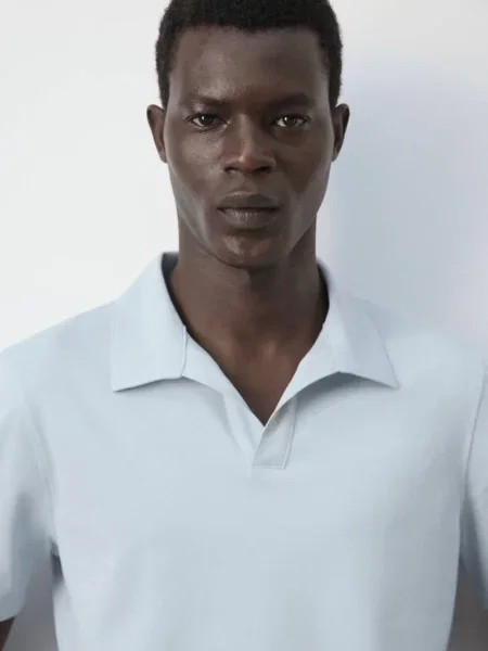 Koszulka polo slim fit z piki z mieszanki bawełny Mężczyzna L MANGO MAN błękitny