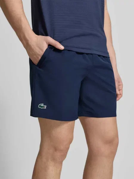 Szorty Sport o kroju loose fit z pasem z siateczki Lacoste Sport