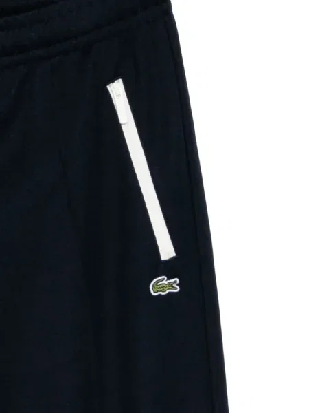 Pantaloni Lacoste cu broderie albastru