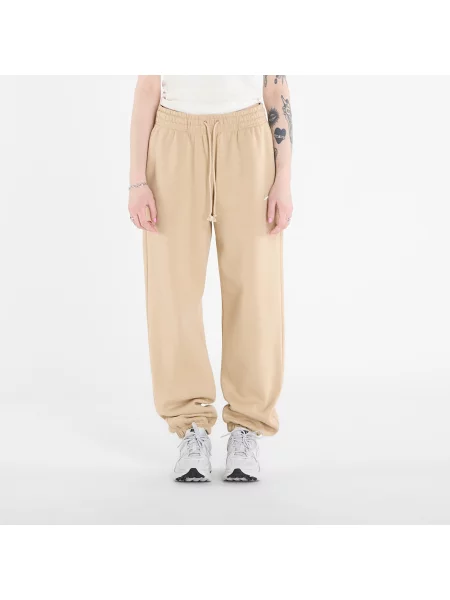 Lniane spodnie Nike z wysoką talią