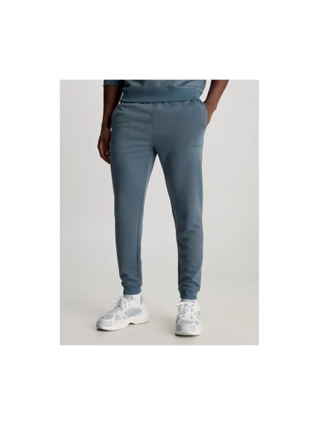Pantaloni Calvin Klein Jeans tricotate albastru