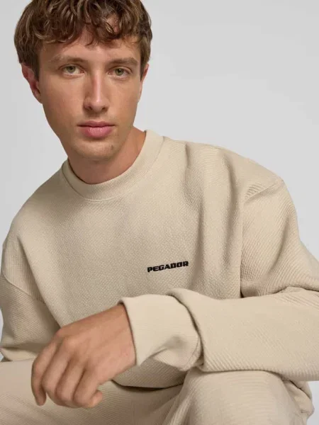 Bluza o kroju oversized z wyhaftowanym logo i okrągłym dekoltem Pegador