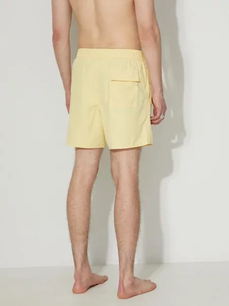 Шорты Lacoste желтые