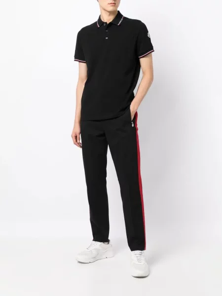 Dryžuotos siaurėjantys kelnės Moncler juoda
