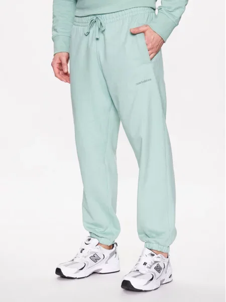 New Balance Spodnie dresowe zielony