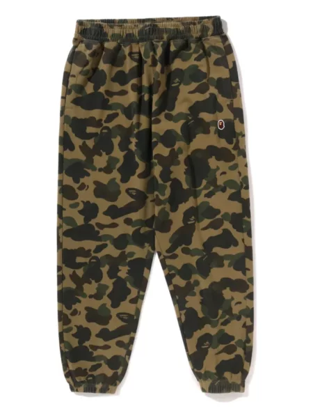 Pantaloni A Bathing Ape® cu imagine cu model camuflaj verde