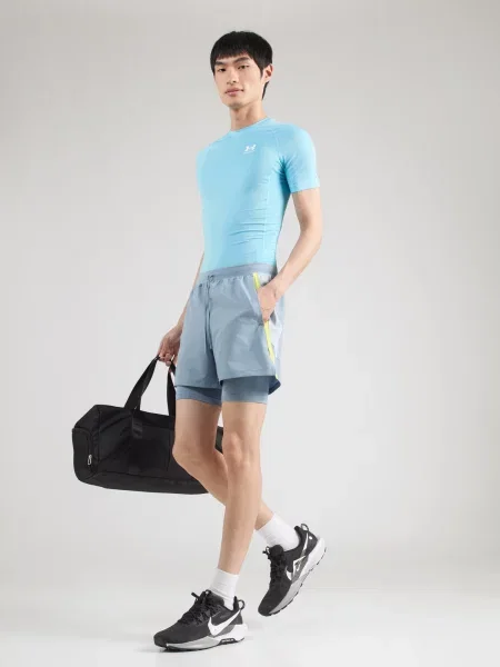 UNDER ARMOUR Športové nohavice LAUNCH opálová / žltá biela