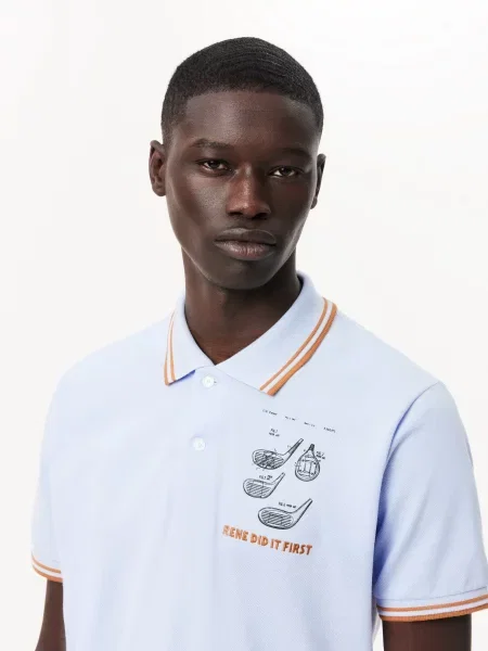 Поло Lacoste голубое