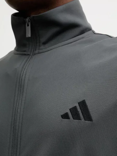 Костюмні штани Adidas сірі