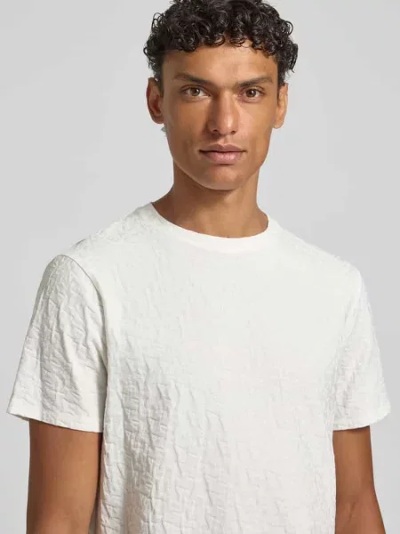 T-shirt z wzór z logo i okrągły dekolt Armani Exchange beżowa