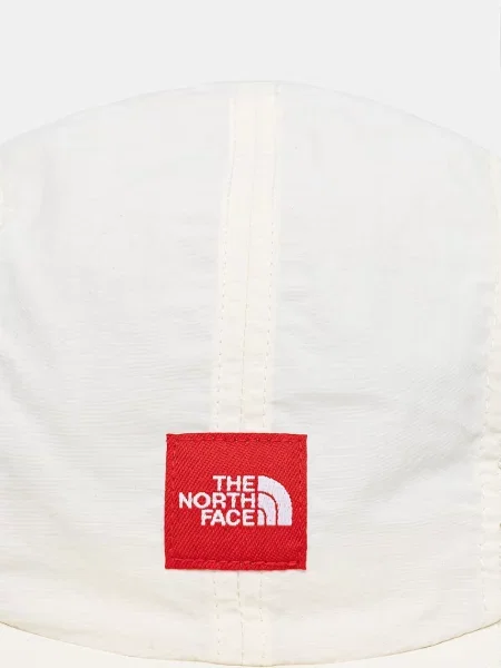 The North Face kapa s šiltom bela