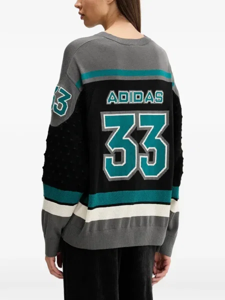 Sneakersy Adidas Predator w paski z dekoltem w serek z kapturem różowe